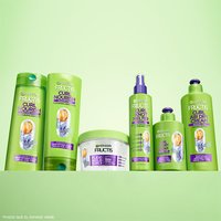 Complete Garnier Fructis curly hair care collection: featuring Curl Nourish shampoo and conditioner, Flexi Hold Curls gel, Curl Knot Melter, and Curl Air Dry Cream for a full frizz-free routine.