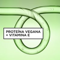 Close-up of a glossy green curl-shaped gel swirl formula, highlighting a formula infused with vegan protein and vitamin E.