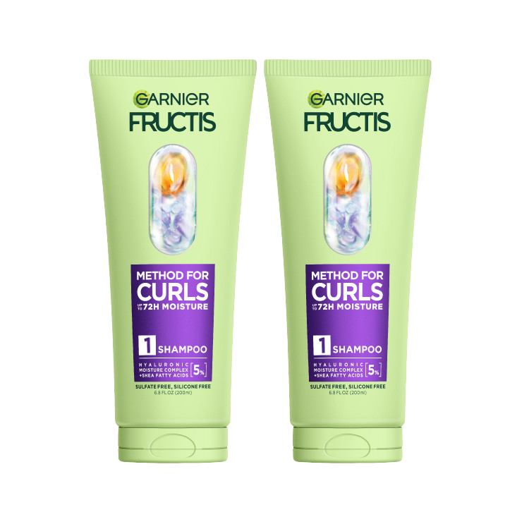 Two light green tubes of Garnier Fructis Method for Curls Shampoo, designed for up to 72 hours of moisture. Each bottle highlights "HYALURONIC MOISTURE COMPLEX + SHEA FATTY ACIDS [5%]" and is "SULFATE FREE, SILICONE FREE."