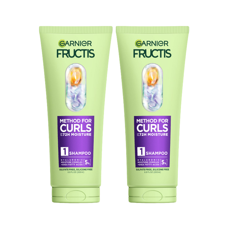 Two light green tubes of Garnier Fructis Method for Curls Shampoo, designed for up to 72 hours of moisture. Each bottle highlights "HYALURONIC MOISTURE COMPLEX + SHEA FATTY ACIDS [5%]" and is "SULFATE FREE, SILICONE FREE."