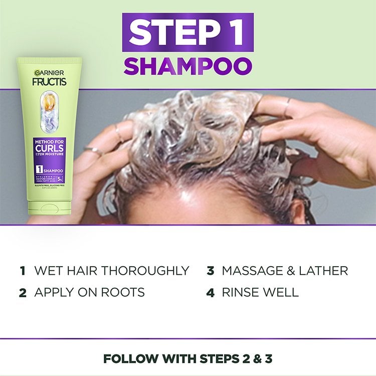 Garnier Fructis 'Step 1 Shampoo' being applied to wet hair, creating lather. Instructions for washing and rinsing hair are included.