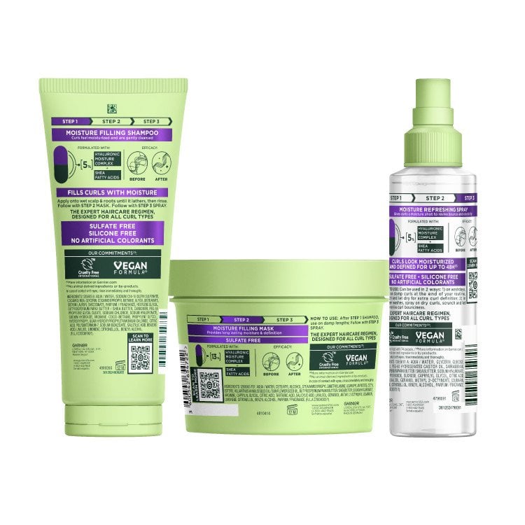 The back labels of the Garnier Fructis Method for Curls Shampoo, Mask, and Spray are visible. The labels provide detailed product information, including step-by-step usage instructions, ingredient lists, and brand commitments such as "SULFATE FREE," "SILICONE FREE," "VEGAN FORMULA," and "Cruelty Free."
