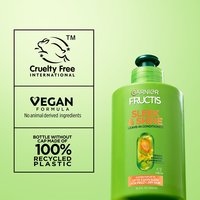 A bottle of Garnier Fructis Sleek & Shine Leave-In Conditioner on the right side, while the left side features claims such as "Cruelty Free International", "Vegan Formula, No animal derived ingredients" and "Bottle without cap made of 100% recycled plastic", indicating Garnier's Greener Beauty commitments.