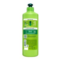 Back pack shot of an XL bottle of Garnier Fructis Sleek & Shine Leave-In Conditioner.
