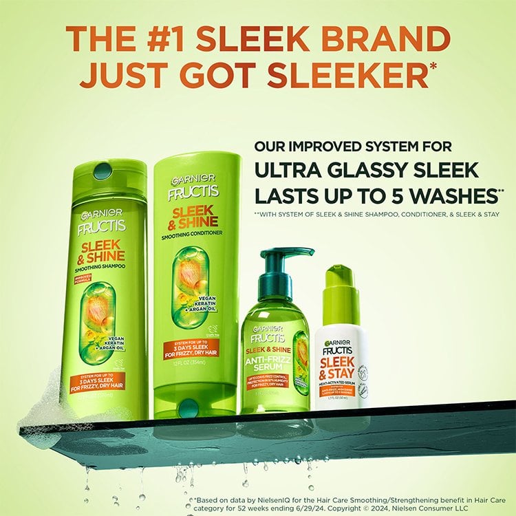 Full Garnier Fructis Sleek & Shine product line: shampoo, conditioner, anti-frizz serum, and heat-activated serum.