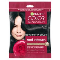 A small, single-use packet of Garnier Color Sensation Root Retouch in Black, featuring an image of a woman with dark hair and a red rose.