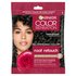 A single-use packet of Garnier Color Sensation Root Retouch in Dark Brown, featuring a woman with dark brown hair and a red rose.