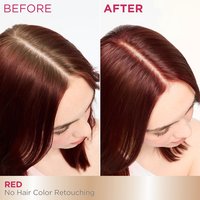 A 'Before and After' comparison showing the top of a woman's head. The 'Before' image displays visible light brown hair at the roots along her part, while the 'After' image shows her hair uniformly dyed red with no brown roots visible.
