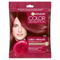 A small, single-use packet of Garnier Color Sensation Root Retouch in Red, featuring a woman with red hair and a red rose.
