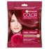 A small, single-use packet of Garnier Color Sensation Root Retouch in Red, featuring a woman with red hair and a red rose.