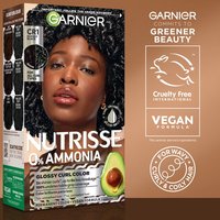 A side view of the product box featuring the "Greener Beauty" commitment, cruelty-free logo, and vegan formula label.