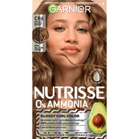 Vertical box of Garnier Nutrisse 0% Ammonia Glossy Curl Color in Shade CR6 Glossy Golden Brown, featuring a woman with light brown curls and an avocado graphic.