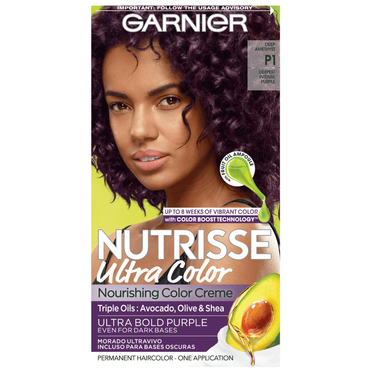 Garnier Nutrisse Ultra Color Nourishing Color Creme in Ultra Bold Purple (P1) featuring a woman with vibrant purple hair.