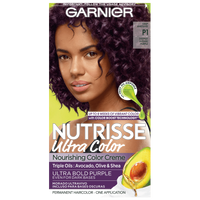 Garnier Nutrisse Ultra Color Nourishing Color Creme in Ultra Bold Purple (P1) featuring a woman with vibrant purple hair.
