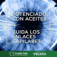 Bold promotional square graphic featuring a vivid blue tie-dye or ink-wash background with soft botanical elements. Large white text reads: "OIL POWERED + BONDING CARE." In the bottom left corner, two certification logos are displayed side by side: Cruelty Free International (leaping bunny) and Vegan (green leaf badge).