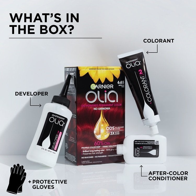 Image showing the contents of the Garnier Olia hair color box, including the colorant, developer, after-color conditioner, and protective gloves.