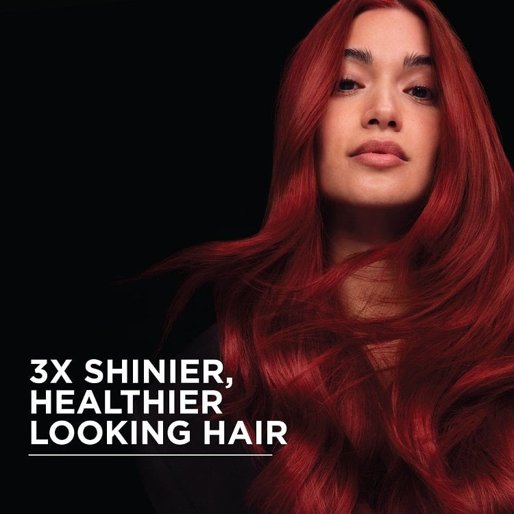 Close-up of a model showcasing the shine and healthy look achieved using Garnier Olia. 