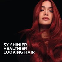 Close-up of a model showcasing the shine and healthy look achieved using Garnier Olia.