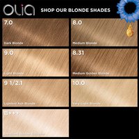Garnier Olia "Shop Our Blonde Shades" reference chart on a white background with a gold sunflower accent in the top right corner. Six blonde hair color swatches are displayed in a grid, labeled with shade numbers and names: 7.0 Open Blonde, 8.0 Medium Blonde, 9.0 (Light Blonde), 8.31 Medium Golden Blonde, 9 1/2.1 Light Ash Blonde, 10.0 Extra Light Blonde, and 10.1 Extra Light Ash Blonde.