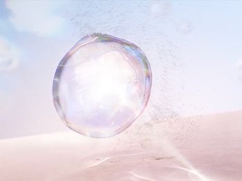Abstract image of a glowing, iridescent micellar bubble, symbolizing cleansing and light skincare.