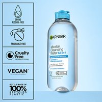 Micellar water bottle with certification icons for dye-free, fragrance-free, cruelty-free, and vegan formula, noting "100% recyclable."