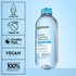 Micellar water bottle with certification icons for dye-free, fragrance-free, cruelty-free, and vegan formula, noting "100% recyclable."