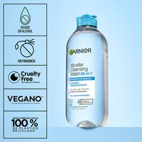 Micellar water bottle with certification icons for dye-free, fragrance-free, cruelty-free, and vegan formula, noting "100% recyclable"