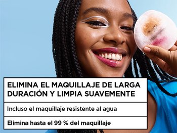 Smiling woman holding a used makeup pad to demonstrate the effectiveness of Micellar Water Waterproof in removal of long-wear and waterproof makeup, featuring text that notes up to 99% of makeup removed.