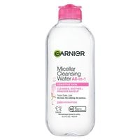 A front packshot of the Garnier Micellar Water All-in-1 with a pink cap. This skin care product is a no-rinse makeup remover and cleanser for face, eyes, and lips.