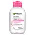A front packshot of the Garnier Micellar Water All-in-1 with a pink cap. This skin care product is a no-rinse makeup remover and cleanser for face, eyes, and lips.