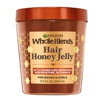 A front visual of the Garnier Whole Blends Honey Treasures Hair Honey Jelly container.