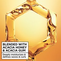 The Garnier Whole Blends Honey Treasures Repairing Milk Honey Spray is blended with acacia honey and acacia gum.