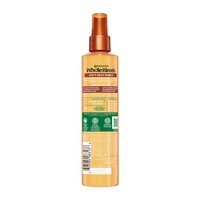 A back visual of the Garnier Whole Blends Honey Treasures Repairing Milk Honey Spray bottle.
