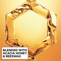The Garnier Whole Blends Honey Treasures Repairing Milk Honey Spray is blended with acacia honey and beeswax.