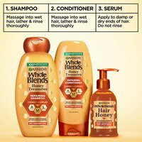Garnier Whole Blends Honey Treasures 4-step hair repair routine: featuring repairing shampoo, conditioner, rich repairing mask, and hair honey serum for nourished, healthy hair.