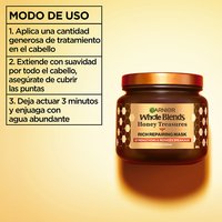 How to use Garnier Whole Blends Honey Treasures Rich Repairing Mask: 3-step guide including applying a generous amount, working through hair ends, and rinsing after 3 minutes for healthy hair results.