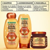 Complete 3-step Garnier Whole Blends Honey Treasures repairing system: featuring repairing shampoo, repairing conditioner, and rich repairing mask for a comprehensive damaged hair care routine.