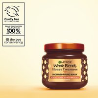 Garnier Whole Blends Honey Treasures Rich Repairing Mask 11.5 fl oz jar: featuring cruelty-free international certification, a 100% recycled plastic jar, and a formula that strengthens hair and reduces breakage.