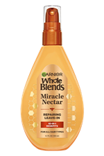 Garnier Whole Blends Miracle Nectar Repairing Leave-In 5.1 fl oz bottle: a honey-infused 10-in-1 treatment for all hair types featuring damaged hair repair.
