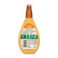 Back view of Garnier Whole Blends Miracle Nectar 10-in-1 Repairing Leave-In bottle showing full ingredient list, usage directions, and 10 repairing benefits.