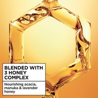 Garnier 3 Honey Complex graphic: featuring a honey-filled hexagon representing the nourishing acacia, manuka, and lavender honey ingredients used in Whole Blends Honey Treasures products.