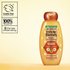 Garnier Whole Blends Honey Treasures Repairing Shampoo hero shot: highlighting cruelty-free international certification, the bee conservancy partnership, and a bottle made of 100% recycled plastic.